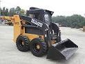 W775 NewLand skid steer loader with attachments